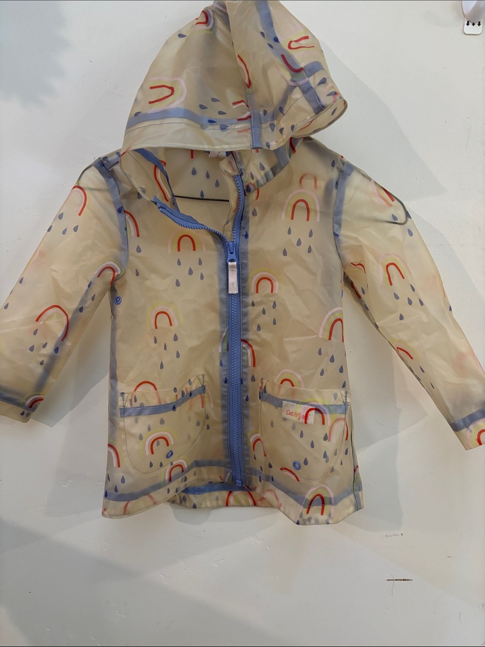 Cat & Jack Cream Hooded Raincoat with Rainbow and Blue Trim